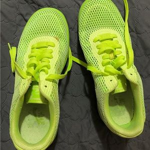 Neon green/yellow Nike shoes